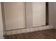 Bedroom features include laminate flooring, drawers and two large closets with sliding doors at 7807 E Main St # D-26, Mesa, AZ 85207