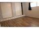 Bedroom features include laminate flooring, drawers and two large closets with sliding doors at 7807 E Main St # D-26, Mesa, AZ 85207