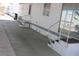 Exterior features include white stairs with railings and access to the home at 7807 E Main St # D-26, Mesa, AZ 85207