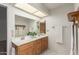 Bathroom featuring double sinks and bright lighting at 7839 E Milagro Ave, Mesa, AZ 85209