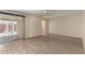 Spacious bedroom with sliding glass doors at 7839 E Milagro Ave, Mesa, AZ 85209
