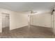 Spacious bedroom with a walk-in closet and ceiling fan at 7839 E Milagro Ave, Mesa, AZ 85209