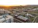 An elevated view of an urban streetscape nestled beneath the backdrop of majestic mountains at 945 E Playa Del Norte Dr # 4019, Tempe, AZ 85288