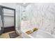 Luxurious bathroom featuring a soaking tub, a marble shower, and contemporary fixtures at 945 E Playa Del Norte Dr # 4019, Tempe, AZ 85288