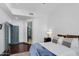 Bright bedroom with hardwood floors, modern furnishings, and ample closet space at 945 E Playa Del Norte Dr # 4019, Tempe, AZ 85288