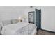 Bright bedroom with white bedding, patterned headboard, and walk-in closet at 945 E Playa Del Norte Dr # 4019, Tempe, AZ 85288