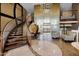 Elegant lobby featuring a staircase, elevator, stylish furniture, and contemporary lighting fixtures at 945 E Playa Del Norte Dr # 4019, Tempe, AZ 85288