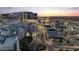 An attractive street view during sunset with palm trees and stunning commercial buildings at 945 E Playa Del Norte Dr # 4019, Tempe, AZ 85288