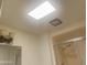 Bathroom featuring a skylight above the shower with glass door at 9708 W Redwood Dr, Sun City, AZ 85351