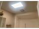 Bathroom featuring shower with sky light, wall mounted sconce at 9708 W Redwood Dr, Sun City, AZ 85351