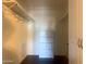 Walk-in closet featuring built-in shelving and a four drawer chest at 9708 W Redwood Dr, Sun City, AZ 85351
