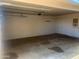 Spacious and clean garage with ample storage space and access to the home at 9708 W Redwood Dr, Sun City, AZ 85351