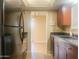 Functional kitchen featuring stainless steel appliances, ample cabinetry, and an adjacent dining area at 9708 W Redwood Dr, Sun City, AZ 85351