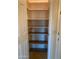 Pantry showcasing corner shelves for convenient organization at 9708 W Redwood Dr, Sun City, AZ 85351