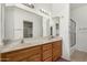 The bathroom includes a double sink vanity and ample lighting, offering a functional and stylish space at 11360 E Keats Ave # 92, Mesa, AZ 85209
