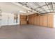 Spacious garage with built-in storage cabinets and epoxy flooring at 11360 E Keats Ave # 92, Mesa, AZ 85209