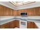 This kitchen showcases ample cabinet space and modern appliances, ready for culinary exploration and enjoyment at 11360 E Keats Ave # 92, Mesa, AZ 85209