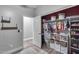 Well-organized walk-in closet features custom shelving and ample storage space at 12211 W Hide Trl, Peoria, AZ 85383