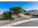 Attractive single-Gathering home featuring low maintenance desert landscaping, and a two-car garage at 12211 W Hide Trl, Peoria, AZ 85383