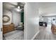 Hallway provides easy access to a living room and another bedroom at 12211 W Hide Trl, Peoria, AZ 85383