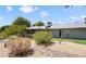 Backyard featuring desert landscaping and a view of the home's exterior at 12826 W Maplewood Dr, Sun City West, AZ 85375