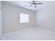Neutral bedroom featuring tile floors, neutral walls, and a window with blinds at 12938 W Tara Ln, Surprise, AZ 85374
