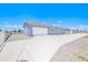 Well-maintained single-story home with an extended driveway and gated entrance for privacy at 12938 W Tara Ln, Surprise, AZ 85374