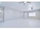 Bright and airy living area with modern finishes, new flooring, and fresh paint throughout at 12938 W Tara Ln, Surprise, AZ 85374