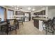 An eat-in kitchen with stainless steel appliances, ample counter space, and seating for casual dining at 13160 W Windsor Ave, Goodyear, AZ 85395