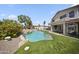 A pristine pool and outdoor living space provide the perfect backdrop for relaxation and outdoor entertaining at 13160 W Windsor Ave, Goodyear, AZ 85395