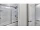 Clean bathroom with a glass-enclosed shower and tub, showcasing bright and modern amenities at 13237 W Redstone Dr, Peoria, AZ 85383