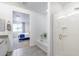 Bright bathroom featuring shower, bath, and doorway leading to bedroom at 13237 W Redstone Dr, Peoria, AZ 85383
