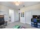 Bright bedroom with neutral carpet, decorative wall art, closet space, and a playful design at 13237 W Redstone Dr, Peoria, AZ 85383