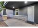 Covered front porch with stone accents, providing a welcoming entrance to the home at 13237 W Redstone Dr, Peoria, AZ 85383