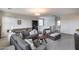Open living room with comfortable seating and neutral tones at 13237 W Redstone Dr, Peoria, AZ 85383
