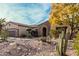 Beautiful desert landscaping with a large shade tree in front of this lovely single-Gathering home at 15452 W Skyview Way, Surprise, AZ 85374