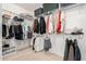 Spacious walk-in closet with ample shelving and hanging storage for optimal organization at 15452 W Skyview Way, Surprise, AZ 85374
