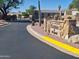 Estates at the Ranch community entrance sign with desert landscaping and a well-maintained roadway at 15634 S 31St St, Phoenix, AZ 85048