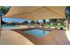 Relaxing hot tub area offers a tranquil retreat with a shaded pergola for ultimate comfort at 15634 S 31St St, Phoenix, AZ 85048