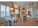 Open-concept kitchen with breakfast nook, tile floors, ample cabinet space, and bright natural light at 15634 S 31St St, Phoenix, AZ 85048