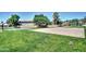 Enjoy outdoor activities with a well-kept volleyball court and basketball court surrounded by lush greenery at 15634 S 31St St, Phoenix, AZ 85048