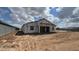 Exterior view of the backyard showing exterior insulation and foundation of future home at 15794 W Cheryl Dr, Waddell, AZ 85355