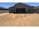 Spacious backyard provides a blank slate for outdoor living and entertainment at 15794 W Cheryl Dr, Waddell, AZ 85355