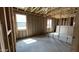 Interior framing with newly installed insulation and light filled windows, awaiting final customization and finishes at 15794 W Cheryl Dr, Waddell, AZ 85355