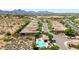Overhead view featuring neighborhood, streets, desert landscape, and a beautiful mountain range at 16538 E Westwind Ct # 51, Fountain Hills, AZ 85268