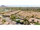 Wide aerial of home, pool, landscaping, and mountain views at 16538 E Westwind Ct # 51, Fountain Hills, AZ 85268