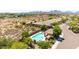 Stunning aerial view of a home with a private pool, spa, and covered patio area at 16538 E Westwind Ct # 51, Fountain Hills, AZ 85268