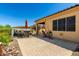 Backyard with patio, outdoor kitchen and desert landscaping at 16538 E Westwind Ct # 51, Fountain Hills, AZ 85268