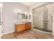 Clean and bright bathroom featuring a walk-in shower with tile surround, and a vanity with a granite countertop at 16538 E Westwind Ct # 51, Fountain Hills, AZ 85268