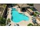Stunning aerial view of the community pool, spa, and covered lounging area surrounded by lush greenery at 16538 E Westwind Ct # 51, Fountain Hills, AZ 85268